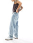 Фото #4 товара ASOS DESIGN baggy jeans with raw waistband in light wash blue