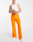 ASOS DESIGN smart flared trousers with front pockets in orange