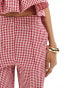 The Frolic straight leg trouser co-ord in gingham in red