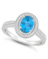 ფოტო #1 პროდუქტის Blue Topaz (1-3/5 ct. t.w.) and Diamond (1/5 ct. t.w.) Halo Ring in Sterling Silver
