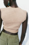 Knit top with contrast topstitching