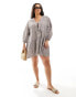 Фото #2 товара Esmee Plus beach tiered smock mini dress with tie front detail in dark brown gingham