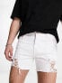 ASOS DESIGN shorter length denim shorts with rips in white