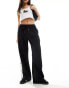 Фото #4 товара ASOS DESIGN straight leg joggers with side poppers in black