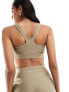 Фото #3 товара Puma Running Evolve medium support sports bra in brown