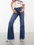 Фото #7 товара Wrangler Barbie co-ord flared jeans in mid blue