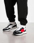 New Balance 327 trainers in white, black and red