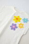 T-shirt with floral appliqué