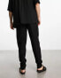 Фото #2 товара ASOS DESIGN relaxed trousers in broderie texture in black