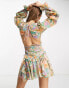 Фото #4 товара ASOS DESIGN ruched waist plunge mini dress with ruffle skirt and open back detail in blurred floral print