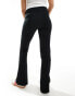 Bershka flared tailored trousers in black