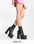 Фото #2 товара ASOS DESIGN Wide Fit Evelyn high-heeled platform boots in black