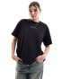 Фото #2 товара Champion Legacy drop shoulder t-shirt in black