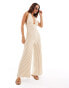 ASOS DESIGN halter neck crochet wide leg jumpsuit in neutral stripe