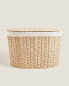 Oval fabric-lined laundry basket