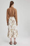 Фото #26 товара Макси юбка смешанная с цветочным узором defacto B1363ax23hs.