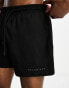 COLLUSION shorter length swim short in black