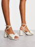 ASOS DESIGN Hitched bow detail mid heeled sandals in ivory