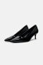 Heeled shoes with a faux patent finish