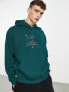 ASOS DESIGN oversized hoodie in green with mountain embroidery