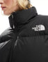 The North Face Saikuru cropped puffer jacket in pink and black