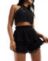 Фото #1 товара ASOS DESIGN pom pom trim rara shorts in black