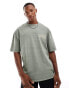 ASOS DESIGN oversized t-shirt in washed green fabric with celestial text chest print