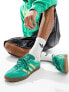 adidas Originals Gazelle Indoor trainers in green and yellow