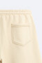 Bermuda shorts with contrast topstitching