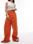 Topshop high waist oversized straight leg pocket cargo trouser in orange