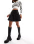 Pieces pleated mini skirt with contrast stich in black