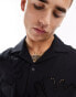 Bershka broidered flower shirt in black