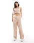 Фото #1 товара Miss Selfridge tailored wide leg pull on trouser in pink pinstripe co ord