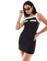 Фото #1 товара ASOS DESIGN 60s mini dress with contrast pocket detail in black