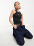Nike Dance mini swoosh rib vest in black
