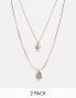 Фото #1 товара ASOS DESIGN 2 pack necklace with cross and St Christopher pendant in gold tone