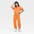 Women's Cinch Hem Woven Cargo Pants - JoyLab Orange L