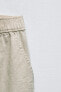 Wide-leg linen-blend trousers
