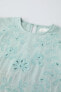 Shirt with cutwork embroidery