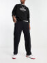 Фото #4 товара Спортивный костюм Weekday Ken черного цвета с прямым кроем