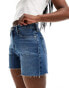 Calvin Klein Jeans mom denim shorts in mid wash