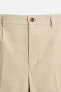 TECHNICAL CHINO TROUSERS