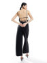 Edited backless strappy jumpsuit in black