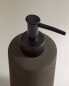 Dark metal bathroom soap dispenser