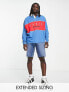 ASOS DESIGN oversized long sleeve rugby polo in blue & red colour block with France print