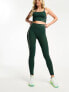 Hummel stretch legging with side panel in dark green