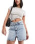 Фото #1 товара ASOS DESIGN denim mini skirt with cross front waist in light wash