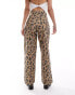 Фото #2 товара COLLUSION X015 baggy jeans in washed leopard print