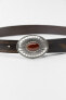 Leather belt with embossed metal buckle