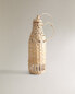 Bottle with rope cover